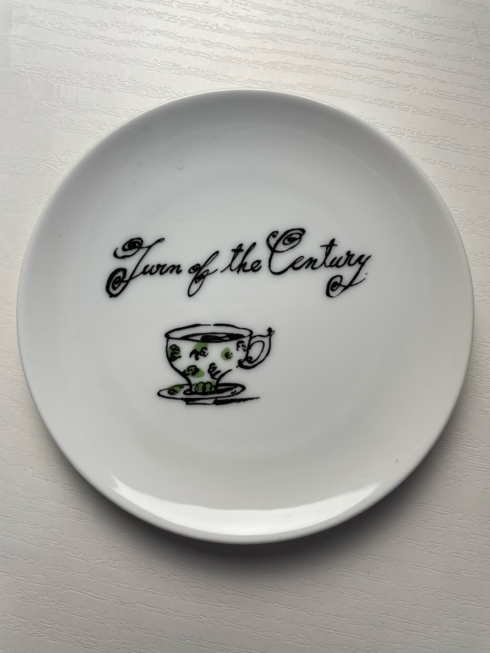 Pottery Barn White Saucer with Black Script and Green Teacup Motif
